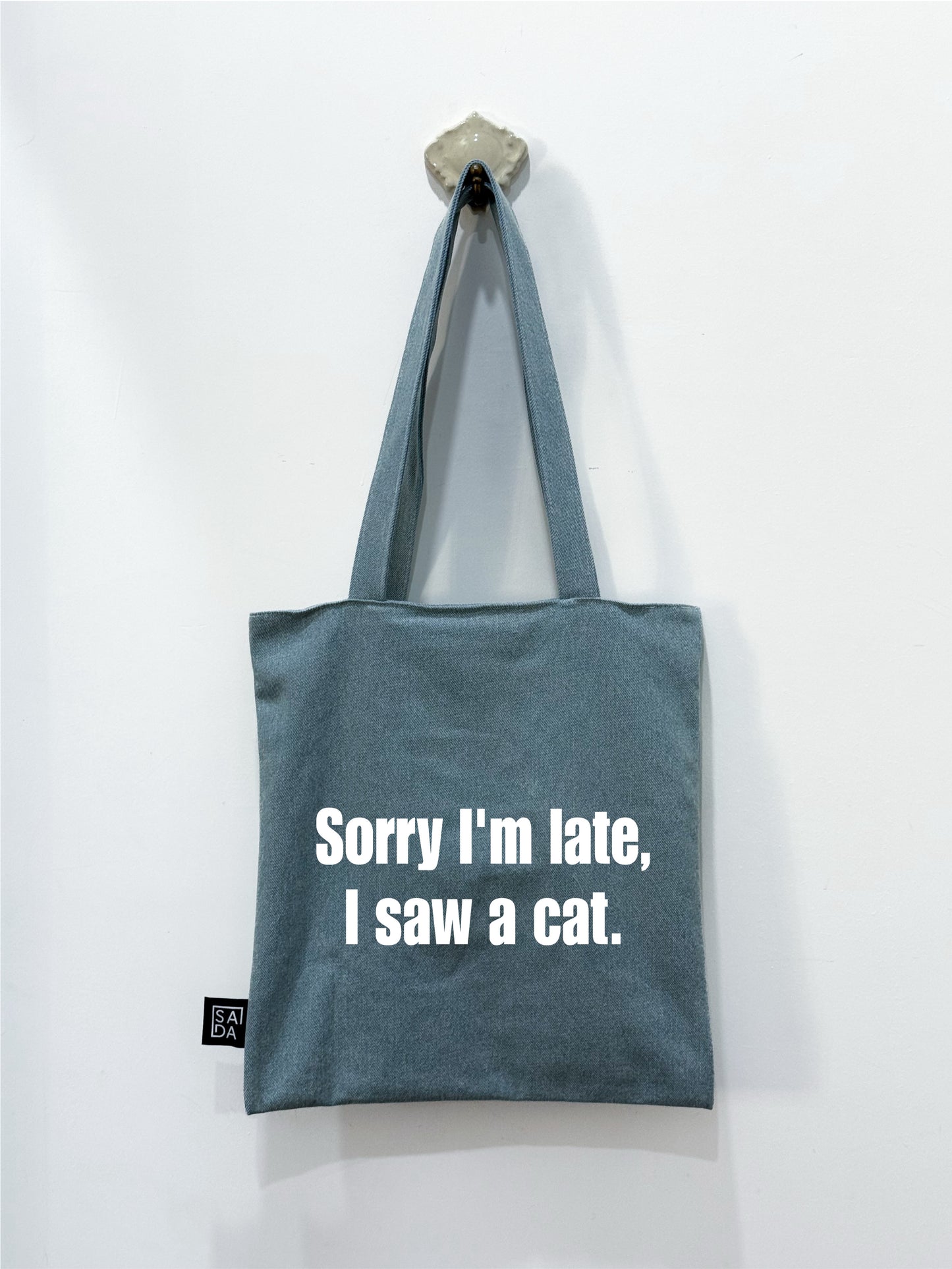 Sorry I’m late I saw a cat tote