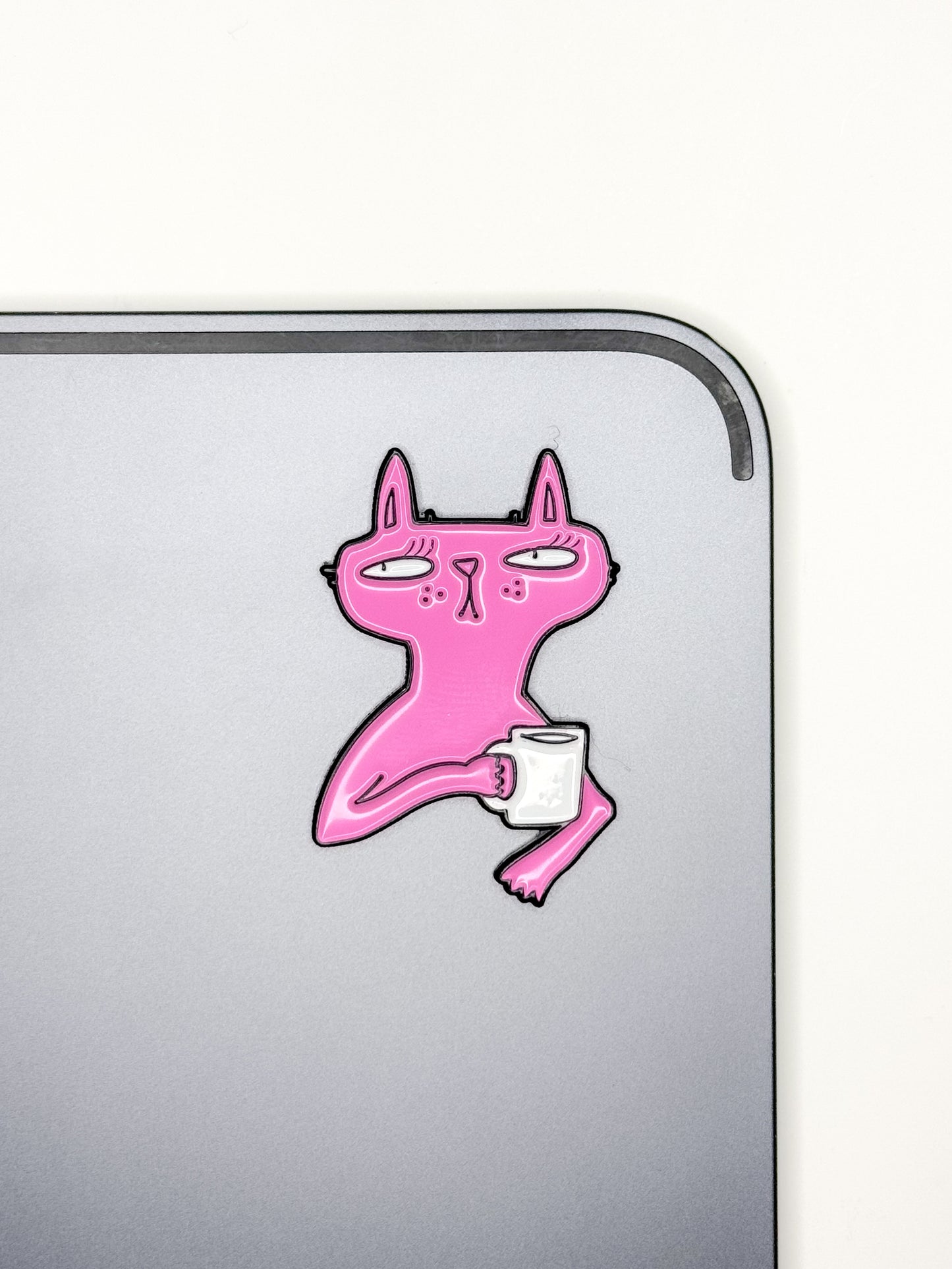Pink cat with a mug