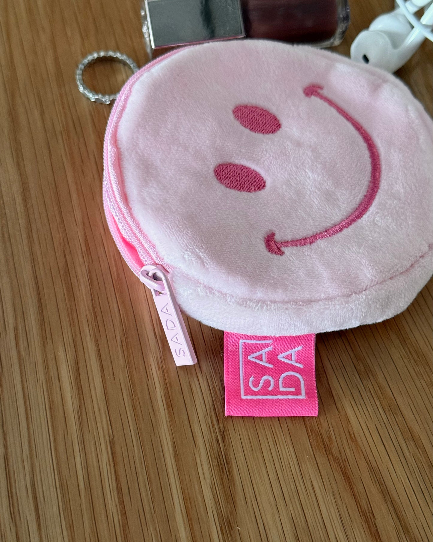 Pink smiley face little pouch