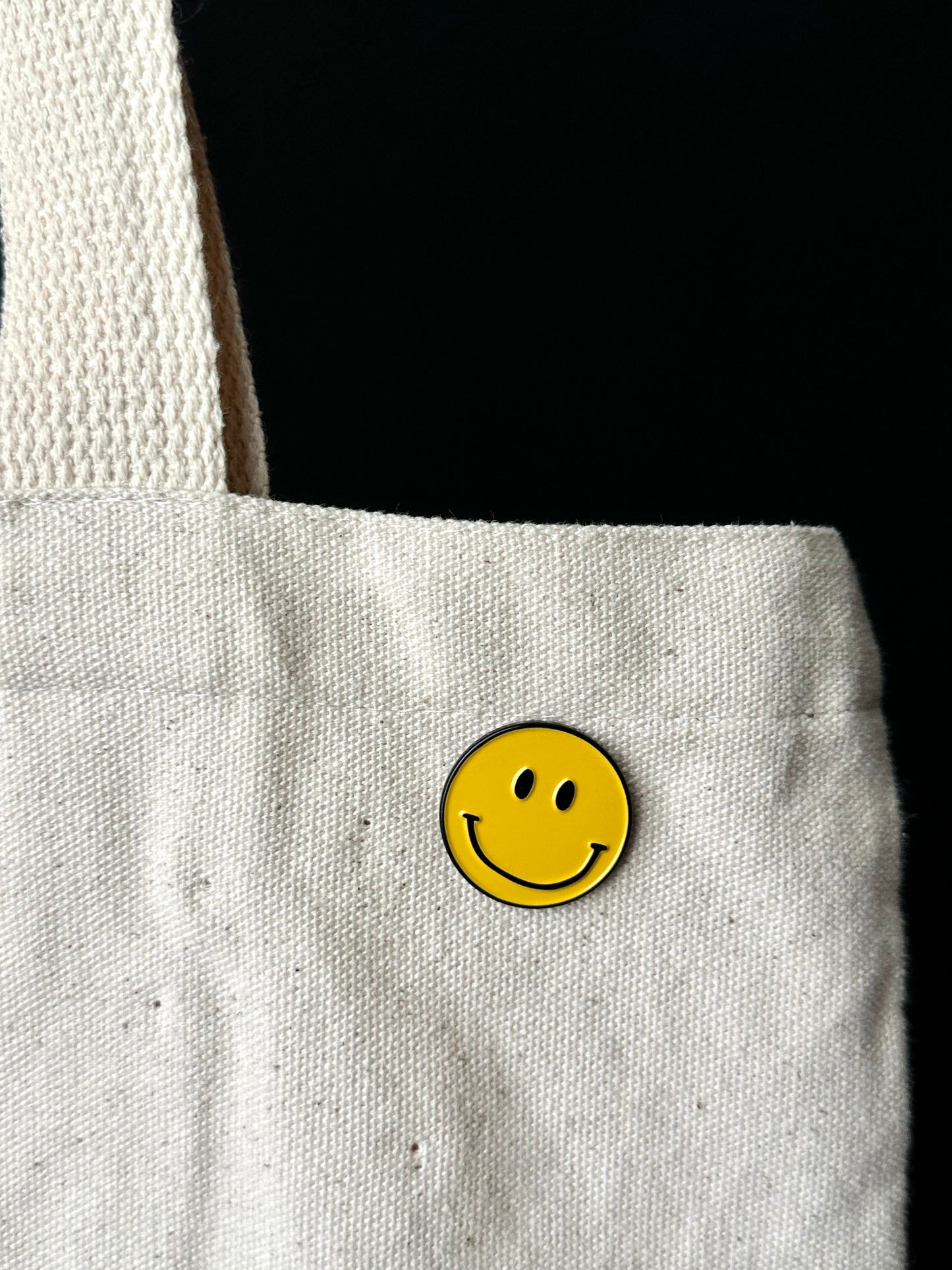 Yellow Smiley face pin