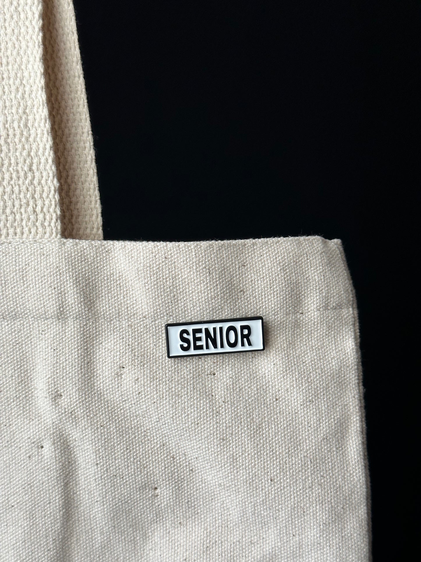 Senior pin