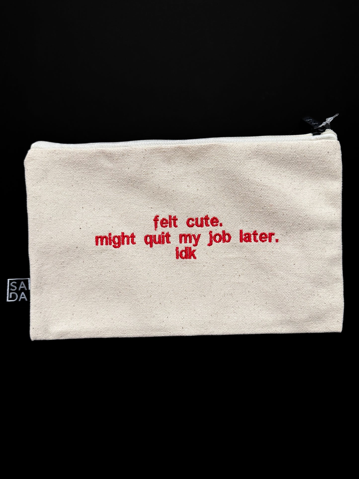 Felt cute might quite my job later idk pouch