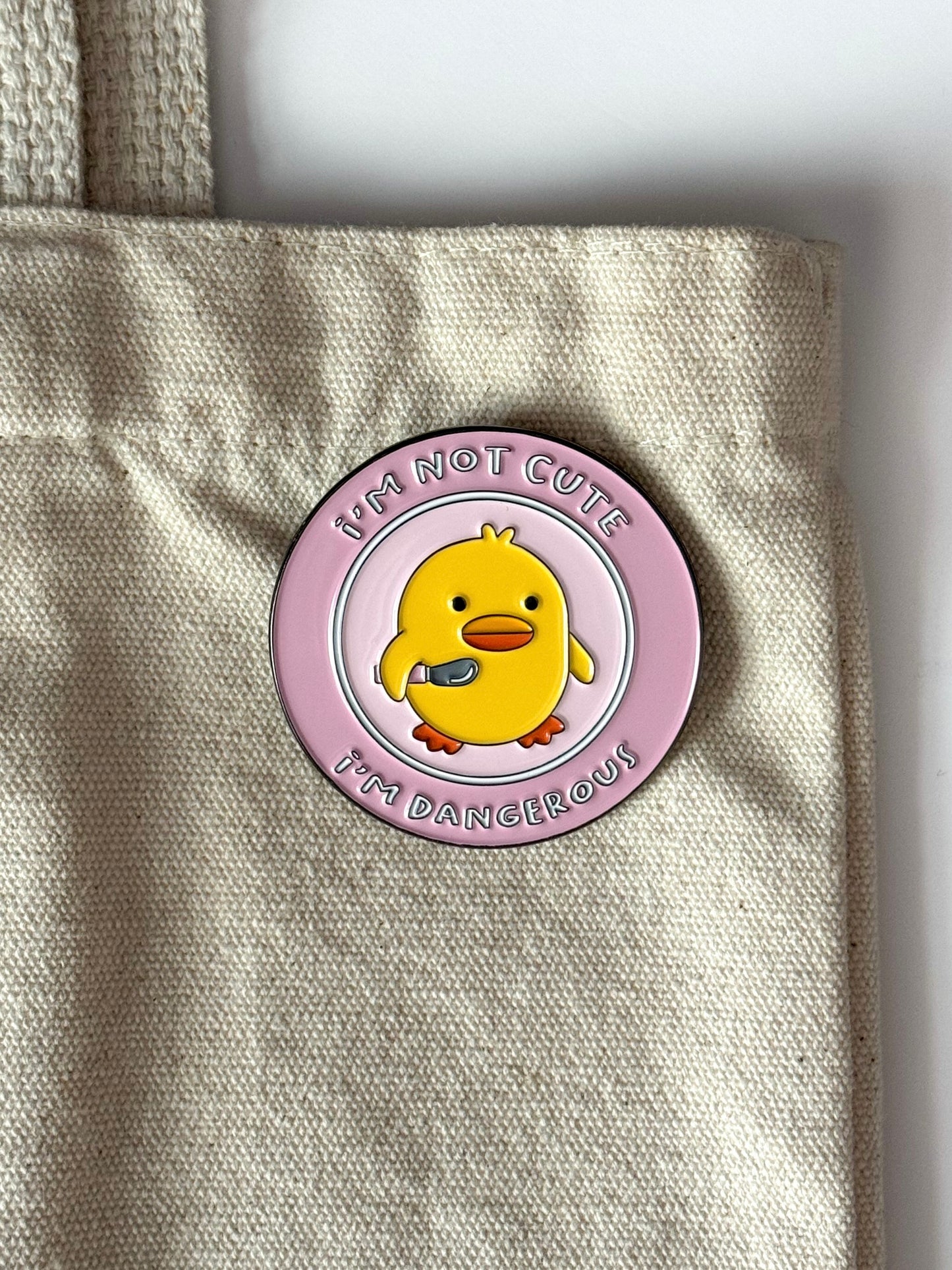 I'm not cute I'm Dangerous pin