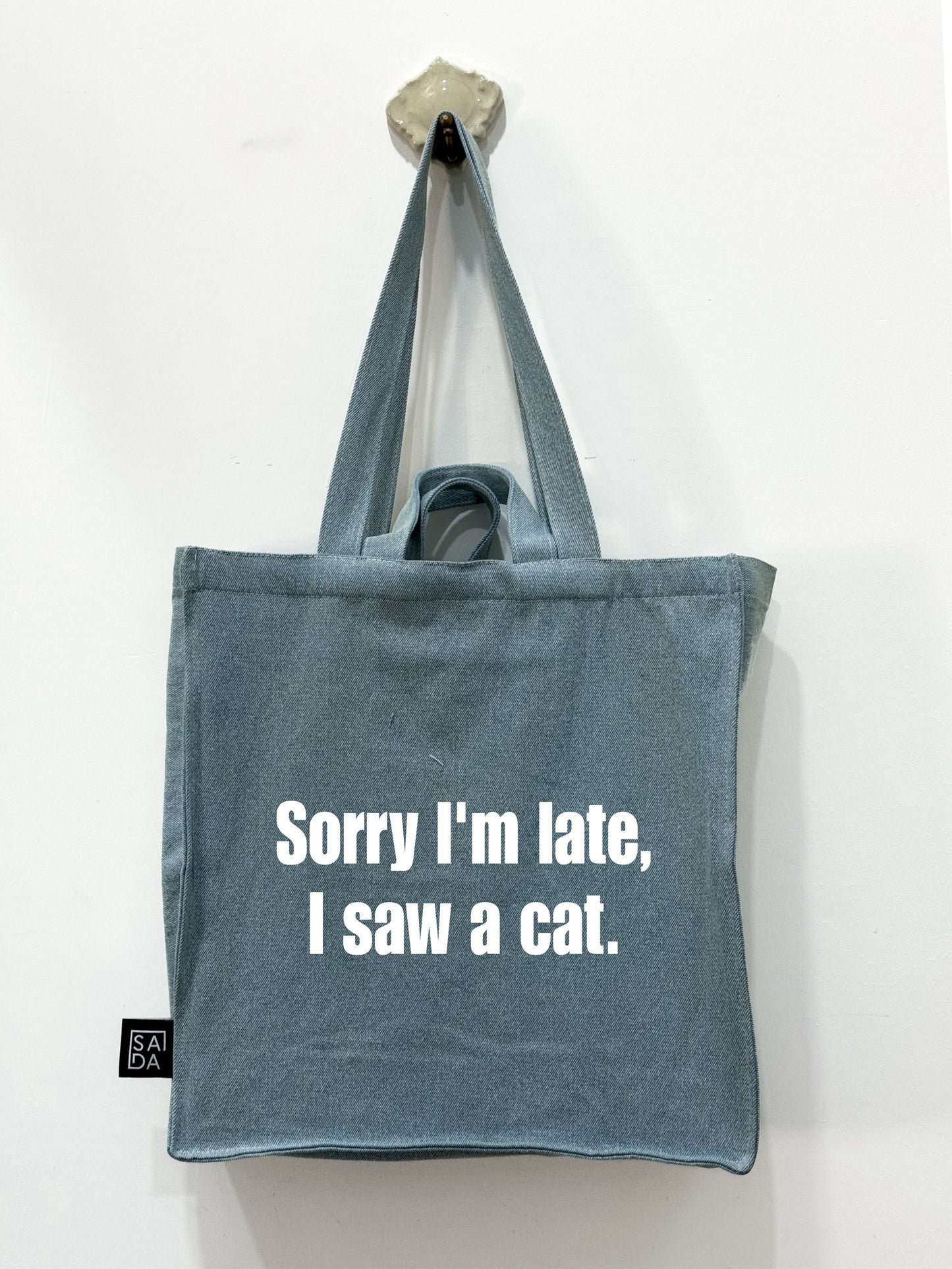 Sorry I’m late I saw a cat tote